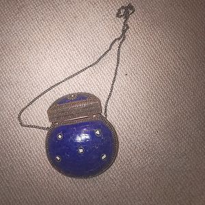 Beautiful. Vintage clutch purse hand made in the 80s.